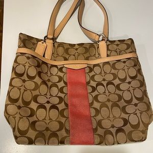 Coach purse with beautiful pink stripe